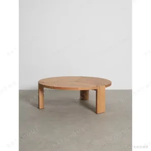 Oak Round Coffee Table with Three-Way Marquetry, 110 cm in natural oak — in a room setting