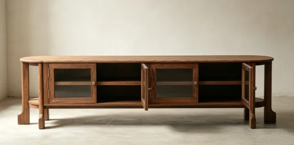 Oak Curved TV Stand with Glass Doors and Sculpted Legs in walnut — in a room setting