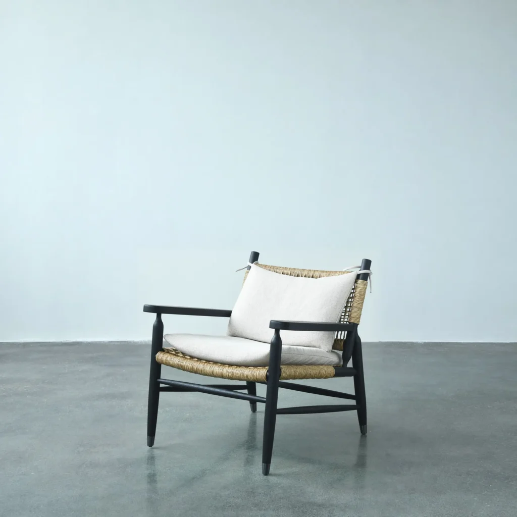 Black Oak Lounge Chair with Rattan Seat and Down Cushion in black — front view