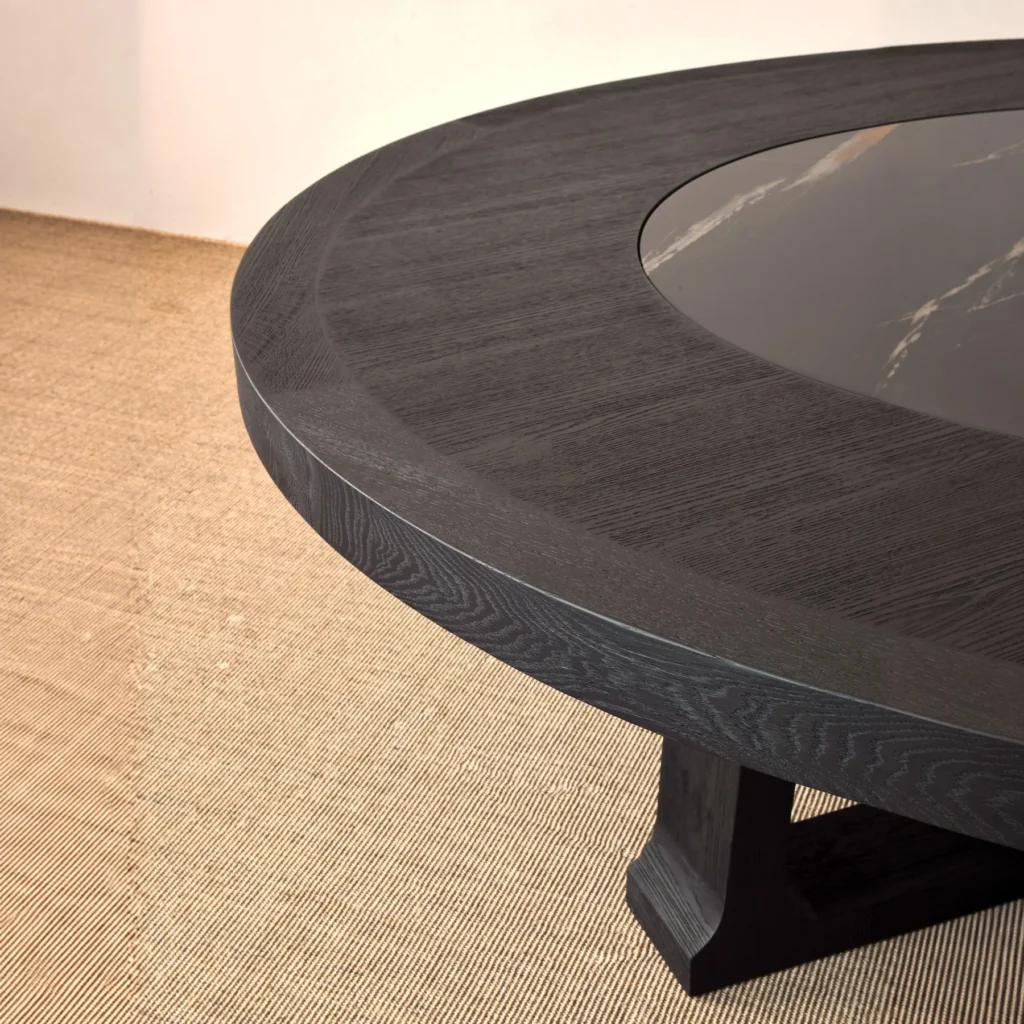 Matte Black Brushed Oak Round Table with Stone Lazy Susan in black — front view