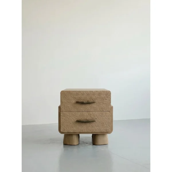Hand-Chiselled White Oak Nightstand on Sculpted Legs in natural oak — in a room setting