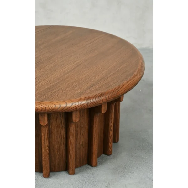 Oak Vertical Ridge Round Coffee Table in Dark Vintage Stain — in a room setting