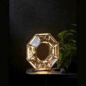 Octagonal Prism Halo Table Lamp in Smoked Glass — in a room setting