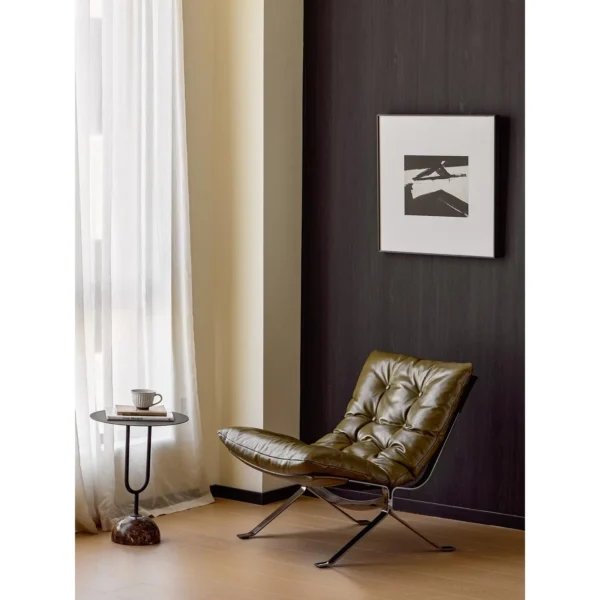 Ohm Lounge Chair in Natural Full-Grain Leather on Steel Base — in a room setting