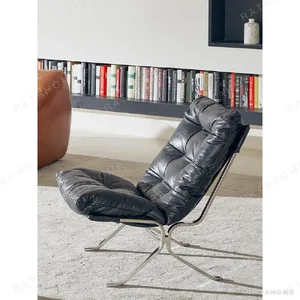 Ohm Black Oil-Wax Leather Lounge Chair in black — in a room setting