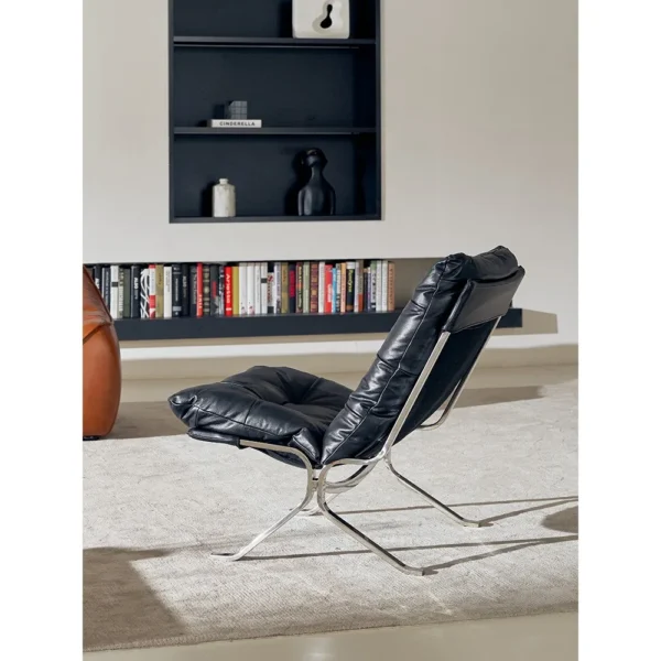 Ohm Black Oil-Wax Leather Lounge Chair in black — in a room setting