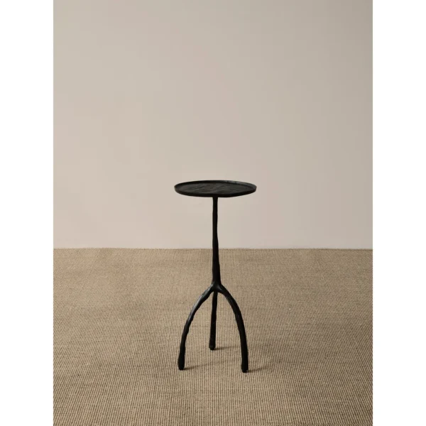 Hand-Forged Brass Tripod Side Table with Textured Top in black — in a room setting