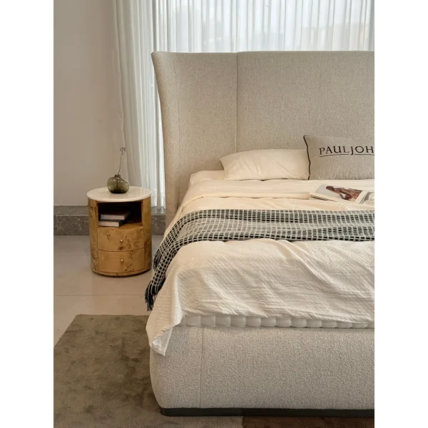 High-Back Winged Linen Bed in oatmeal — in a room setting