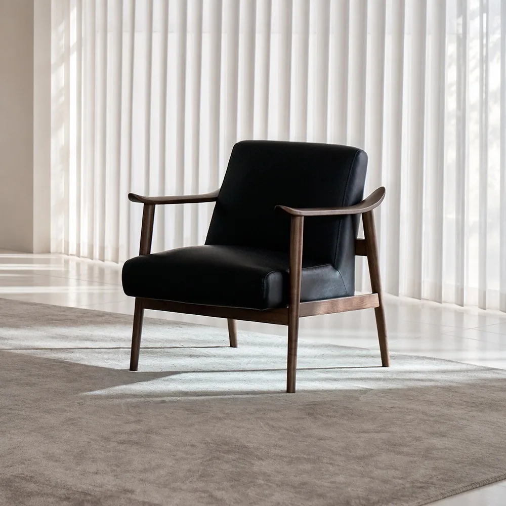 West Mid-Century Ash Armchair in Black Faux Leather — front view