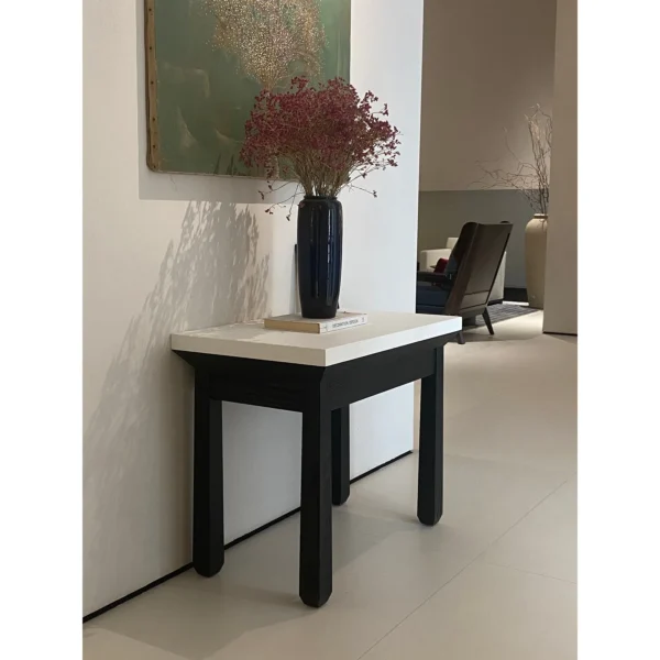 Black Lacquer Side Table with Pale Top in black — in a room setting