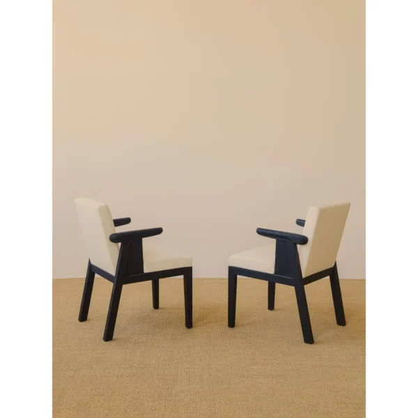 Black Oak Dining Chair with Cream Leather and Wrapped Arms in oatmeal — in a room setting