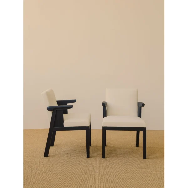 Black Oak Dining Chair with Cream Leather and Wrapped Arms in oatmeal — in a room setting