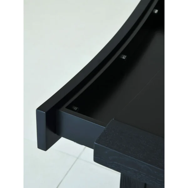 Matte Black Brushed Oak Nightstand on Sled Base in black — in a room setting