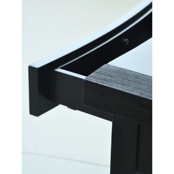 Matte Black Brushed Oak Nightstand on Sled Base in black — in a room setting