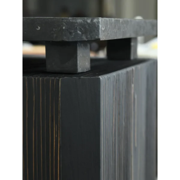 Sandblasted Cedar Pedestal with Stone Top, 110 cm in black — in a room setting