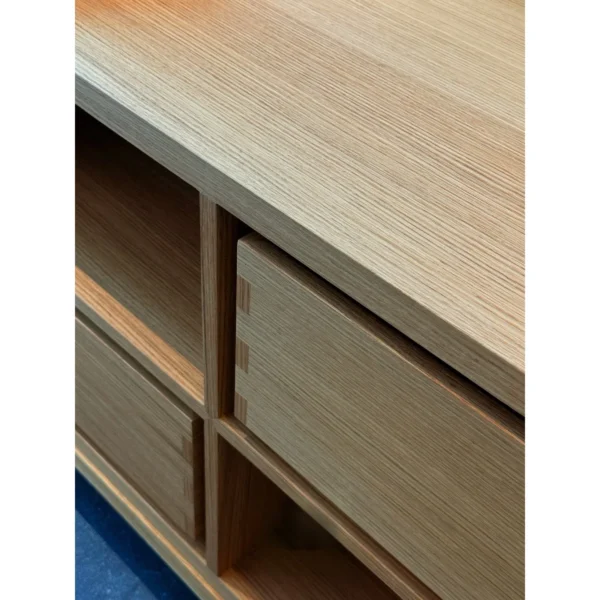 Block Oak Sideboard with Open Cubbies on Tapered Legs in natural oak — in a room setting