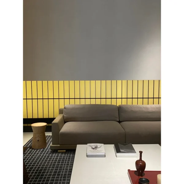 Old-Money Camel Wool Sofa with Bronze Base and Down Cushions in sand — in a room setting