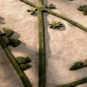 Olive Green Bordered Rug with Botanical Motif in olive — in a room setting