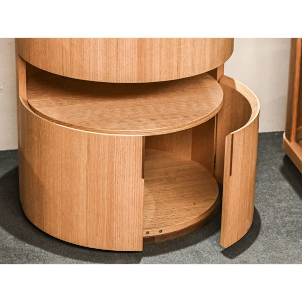 Open Mouth Solid Wood Nightstand with Three Storage Levels in natural oak — in a room setting