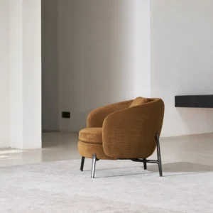 Curved Lounge Chair in Caramel Fabric on Slim Metal Legs — front view