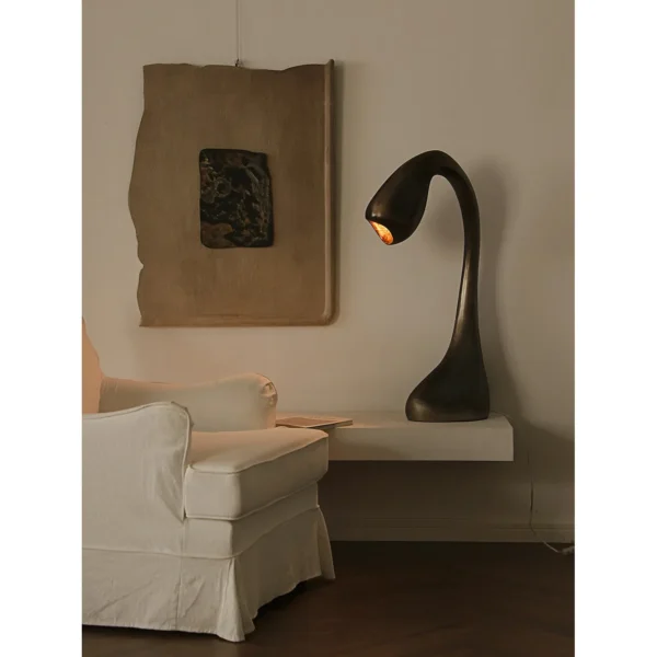 Swan Neck Sculptural Floor Lamp in Bronze — in a room setting