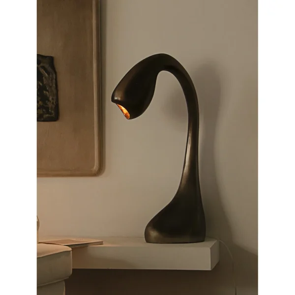 Swan Neck Sculptural Floor Lamp in Bronze — in a room setting