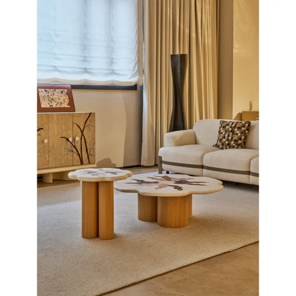 Petal Marble Marquetry Nesting Coffee Table Set in ivory — in a room setting