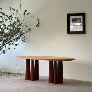 Oriental Marquetry Oval Table on Red Lacquered Metal Legs in red — front view