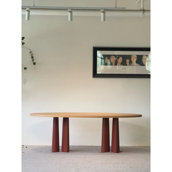 Oriental Marquetry Oval Table on Red Lacquered Metal Legs in red — in a room setting