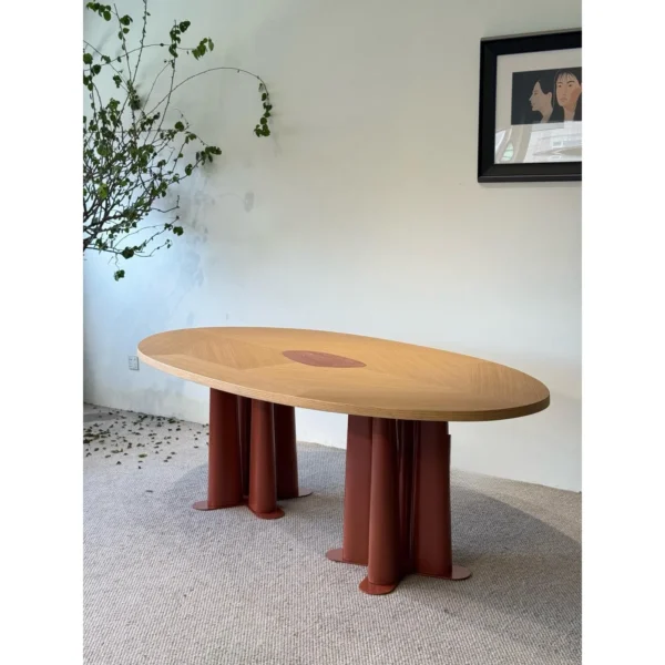 Oriental Marquetry Oval Table on Red Lacquered Metal Legs in red — in a room setting