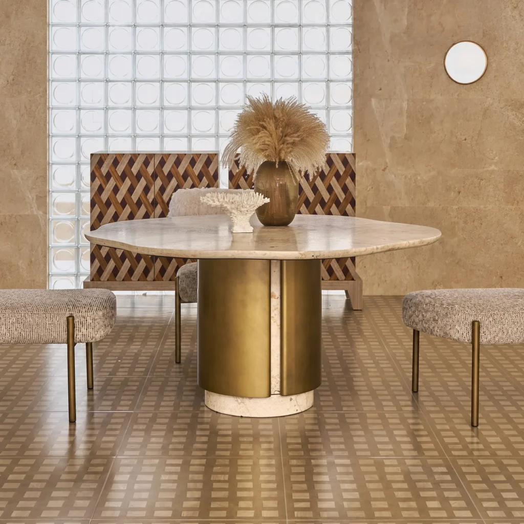 Free-Form Travertine Dining Table on Aged Brass Base in oatmeal — front view