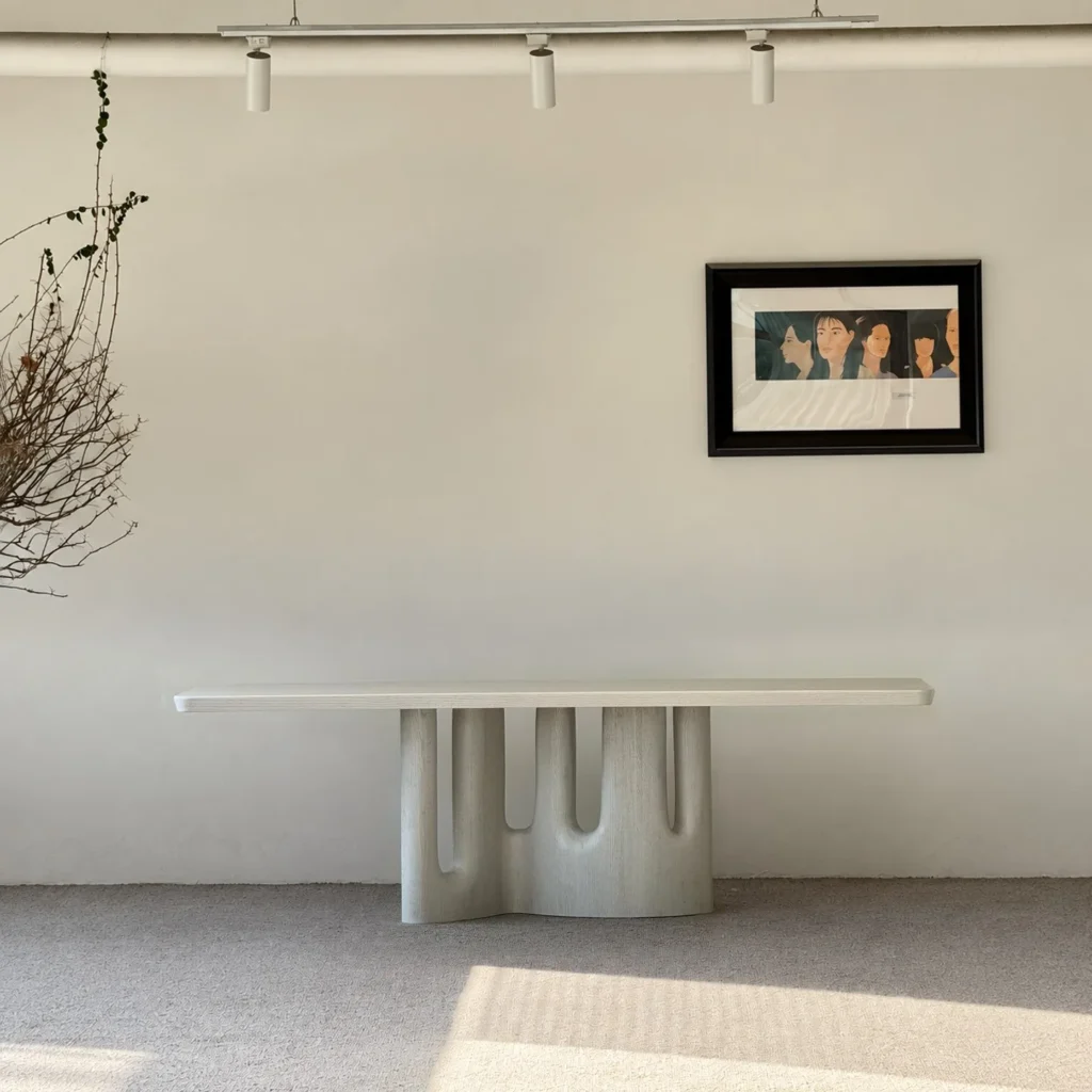 White Long Dining Table on Fluted Arch Base in ivory — front view