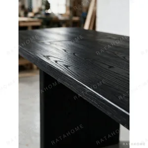 Otoko Black Ash Dining Table with Bridged Panel Legs in black — in a room setting