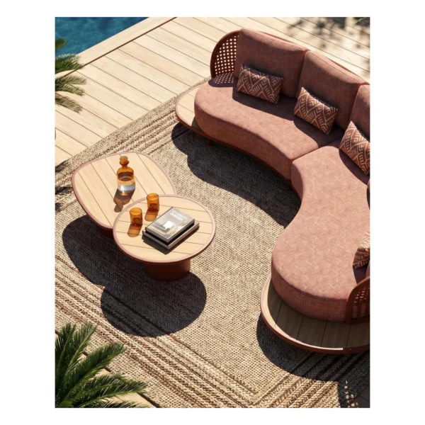 Outdoor Curved Rope Sofa in rust — in a room setting