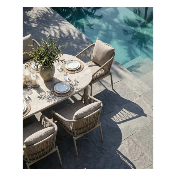 Outdoor Oval Dining Set with Rope Chairs in Cream — in a room setting