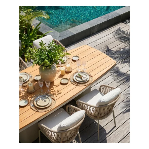 Outdoor Teak Top Dining Set in clay — in a room setting