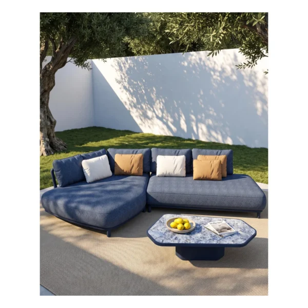 Outdoor L-Shaped Sofa in blue — in a room setting