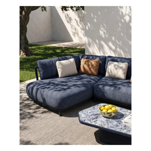 Outdoor L-Shaped Sofa in blue — in a room setting