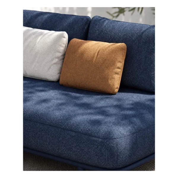 Outdoor L-Shaped Sofa in blue — in a room setting