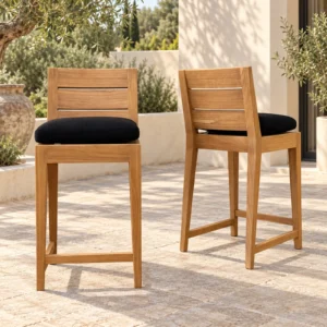 Outdoor Teak Bar Stool with Slatted Back and Black Cushion in natural oak — front view