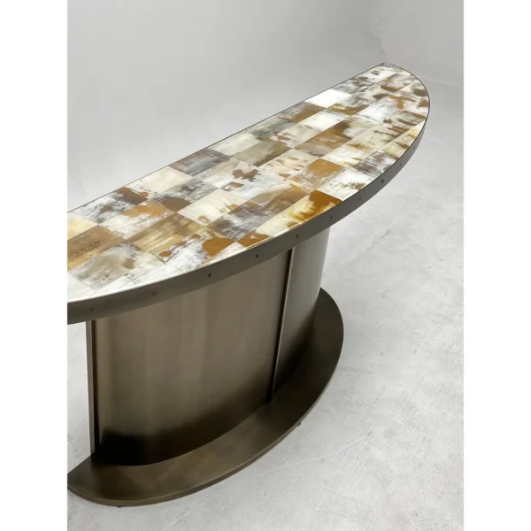 Horn Marquetry Half-Round Console on Brushed Metal Base in clay — in a room setting
