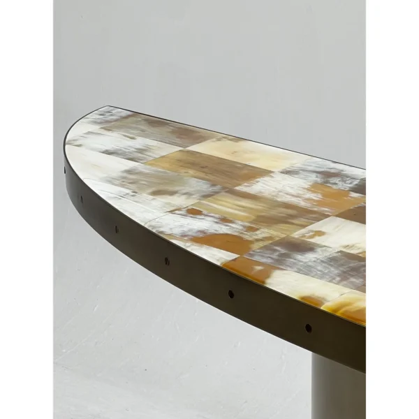 Horn Marquetry Half-Round Console on Brushed Metal Base in clay — in a room setting
