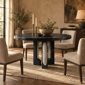 Panmu Round Black Table with Stone-Inset Base in black — in a room setting