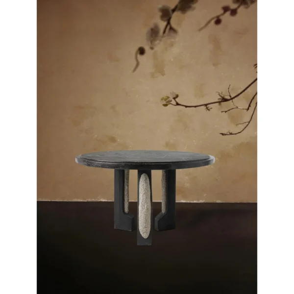 Panmu Round Black Table with Stone-Inset Base in black — in a room setting