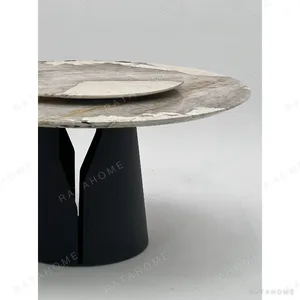 Patchwork Stone Round Table in ivory — in a room setting