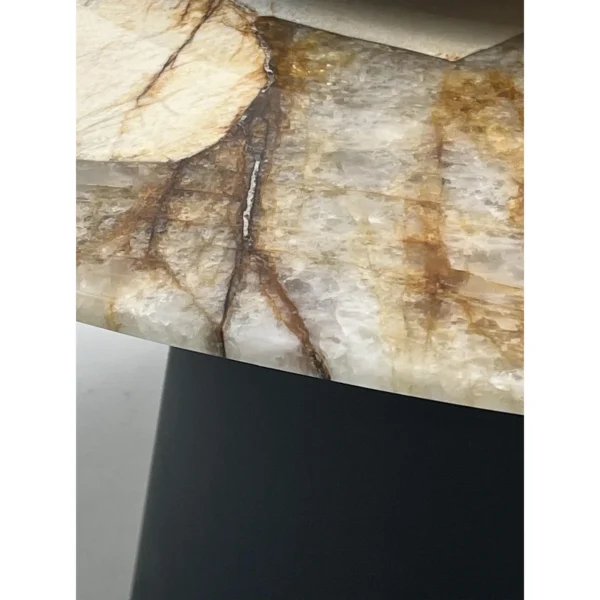 Patchwork Stone Round Table in ivory — in a room setting