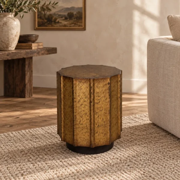 Patina Hand-Worked Metal Faceted Side Table, 35 cm in clay — in a room setting