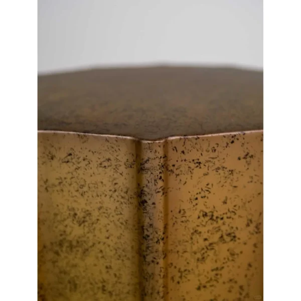 Patina Hand-Worked Metal Faceted Side Table, 35 cm in clay — in a room setting