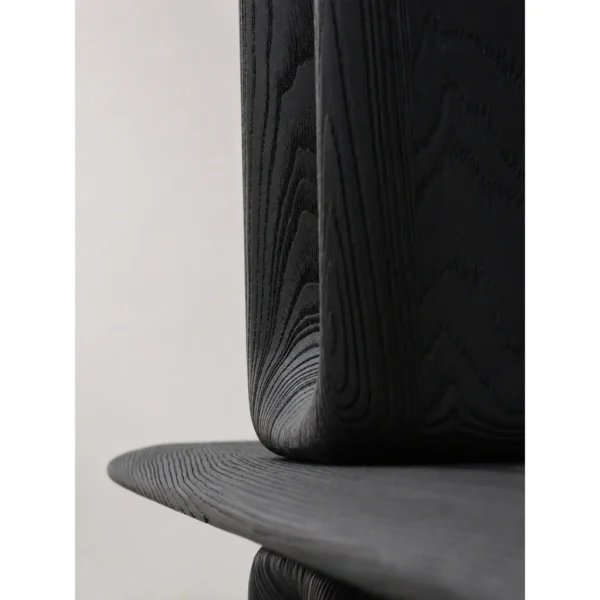 Dark Wood Open Bookcase with Oval Cut-Out Supports in black — in a room setting
