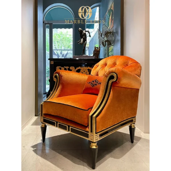 Payton Navy Velvet Tufted Armchair in blue — in a room setting